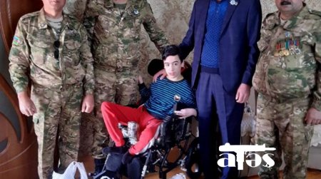 Zəngilanlı döyüşçülər imkansız veteranlara baş çəkiblər