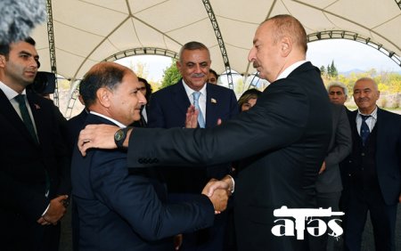 Prezident cəbhəyə yollandığı gün övladı doğulan şəhidin atası ilə görüşdü - Foto